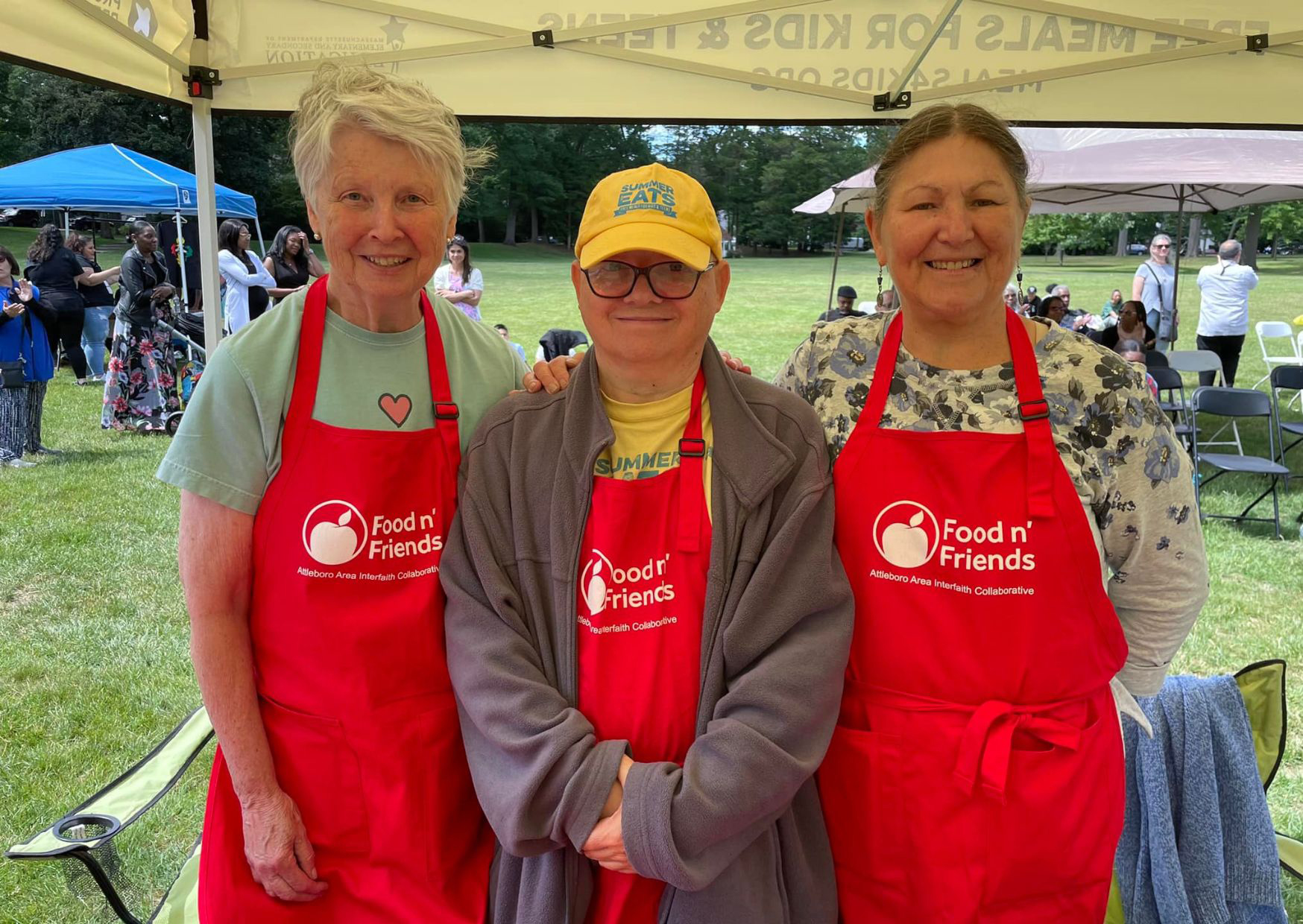 Food n' Friends volunteers distributing meals