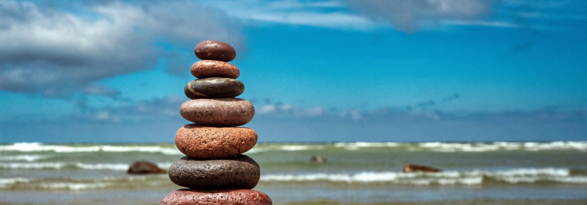 Pile of Stones atop a beach.